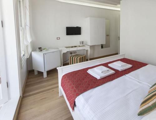 Postel nebo postele na pokoji v ubytování Pi Art Butik Otel