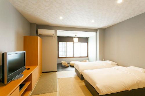 嬉野温泉　旅館吉田屋にあるテレビまたはエンターテインメントセンター