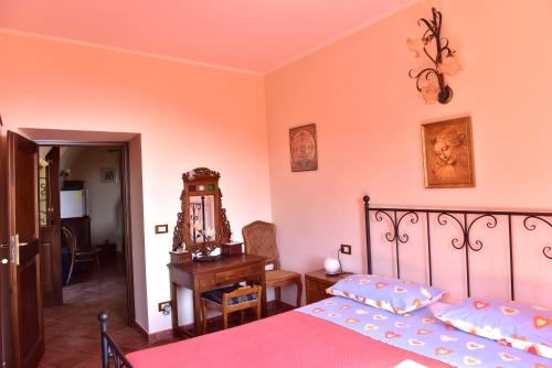 Кровать или кровати в номере Locanda Dei Boi