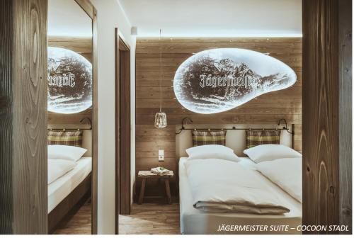 a bedroom with a bed with two large bubbles at Cocoon Hauptbahnhof in Munich