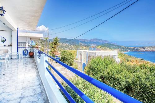 a house with a view of the ocean at A gem next to the sea and close to the airport in Dhaskalión