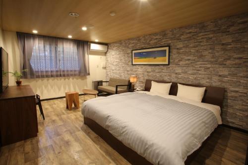 Ένα ή περισσότερα κρεβάτια σε δωμάτιο στο Sundance Resort Karuizawa