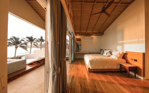 Postel nebo postele na pokoji v ubytování Kundala Beach Resort Hua Hin
