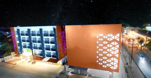 an aerial view of a building at night at Phoenix Hotel Karon Beach in Karon Beach