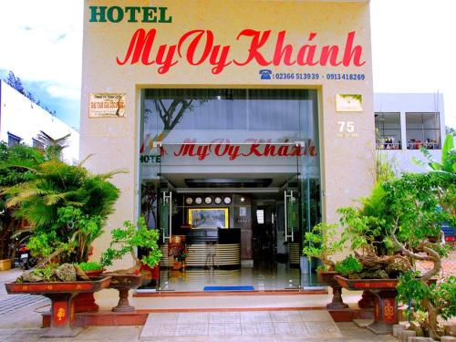 a hotel myyrkolis entrance with plants in front of it at My Vy Khanh Hotel in Da Nang