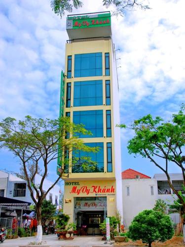 a tall building with a sign on top of it at My Vy Khanh Hotel in Da Nang