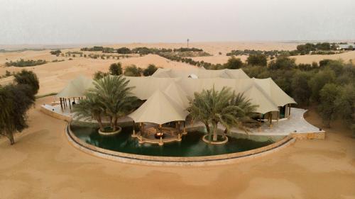 an aerial view of a building in the desert at Telal Resort Al Ain in Al Ain
