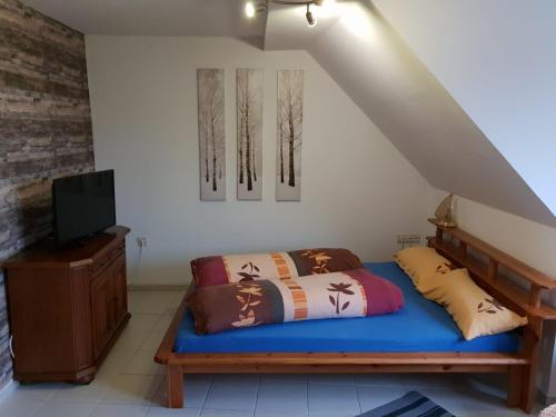 Postel nebo postele na pokoji v ubytování Ferienwohnung Ebeling under stars