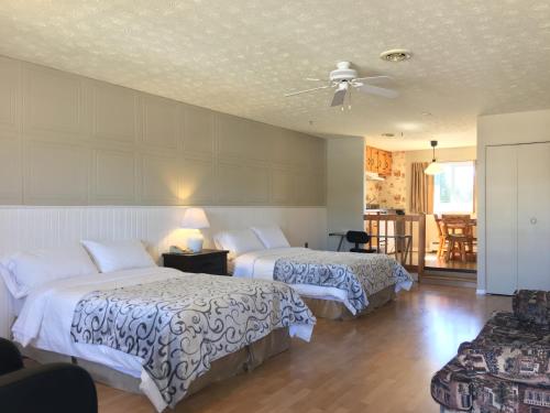 Postel nebo postele na pokoji v ubytování Motel le Sabre