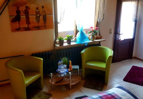 Ruang duduk di Monteurwohnung Aroba