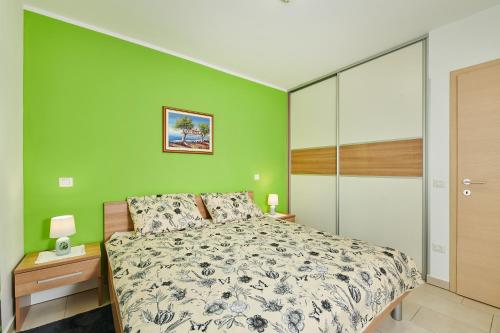 מיטה או מיטות בחדר ב-Apartman Leon