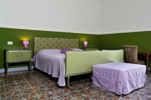 מיטה או מיטות בחדר ב-Maison Decò