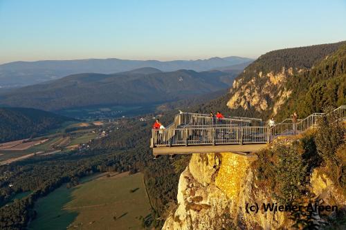 people on a suspension bridge on the edge of a mountain at Hotel Zentral in Wiener Neustadt