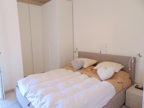 A bed or beds in a room at S068 - Sirolo, nuovo bilocale con terrazzo