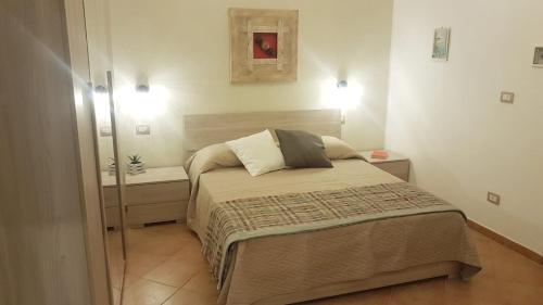 Ein Bett oder Betten in einem Zimmer der Unterkunft B&B Napoli Storica