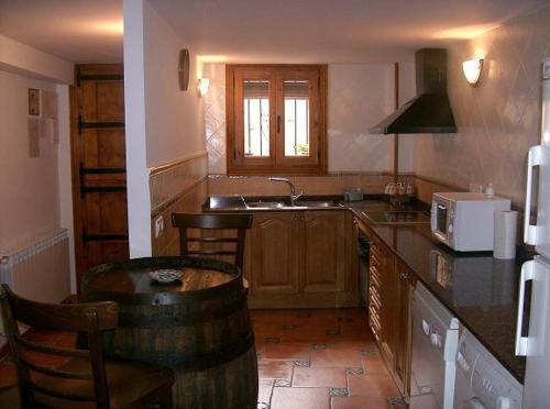 Kuchyň nebo kuchyňský kout v ubytování Casa Rural Benito