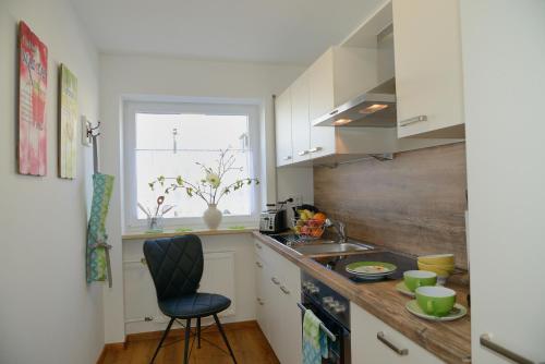 Η κουζίνα ή μικρή κουζίνα στο Ferienwohnung Seenah