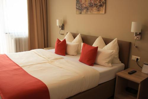 Hotel Alpenlandにあるベッド