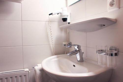 Hotel Alpenlandにあるバスルーム