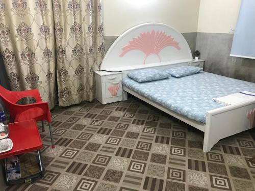 Een bed of bedden in een kamer bij Adam’s House