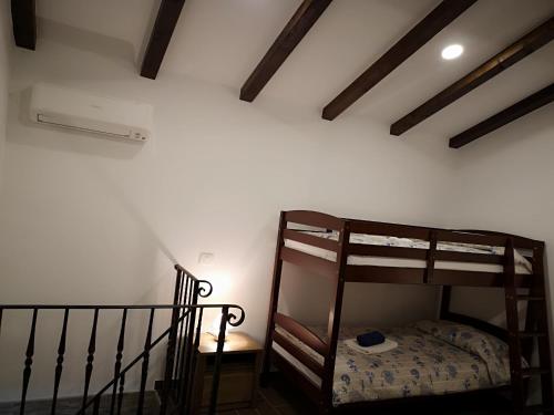 a room with a bunk bed and a staircase at Apartments Gea in Lucija