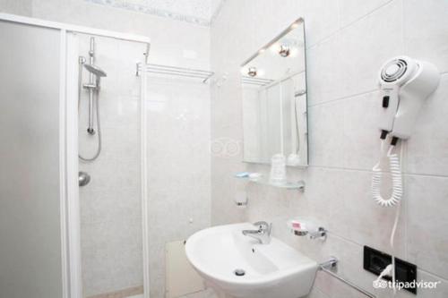 Koupelna v ubytování Porto Cesareo Hotel