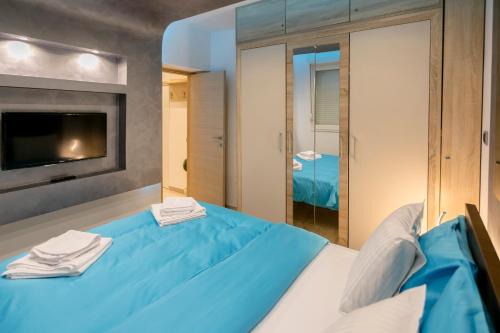 Foto Cosmopolitan One Apartment 2