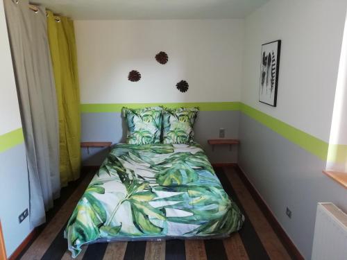 Llit o llits en una habitació de Maison / villa complète à 5 minutes de Colmar