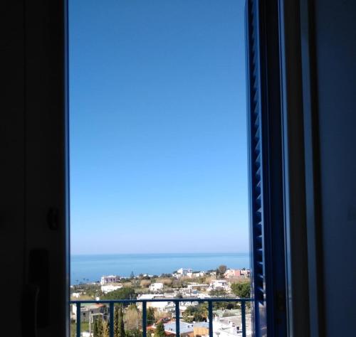 a view of the ocean from a window at Residence Limoneto Ischia in Ischia