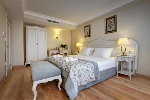 מיטה או מיטות בחדר ב-Arena Hotel - Special Class