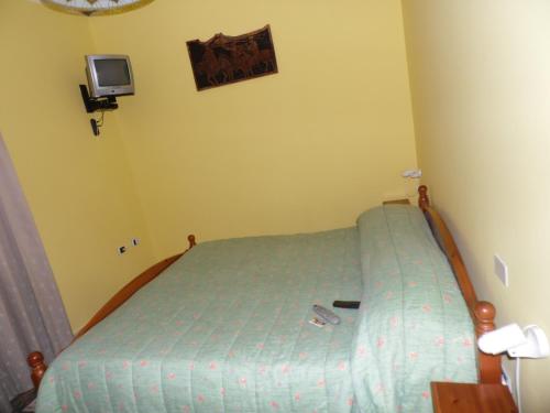 Ένα ή περισσότερα κρεβάτια σε δωμάτιο στο Agriturismo Castello