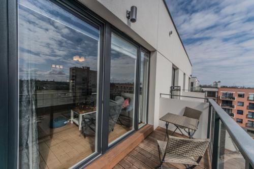Balkon lub taras w obiekcie Cofferdam - BillBerry Apartments