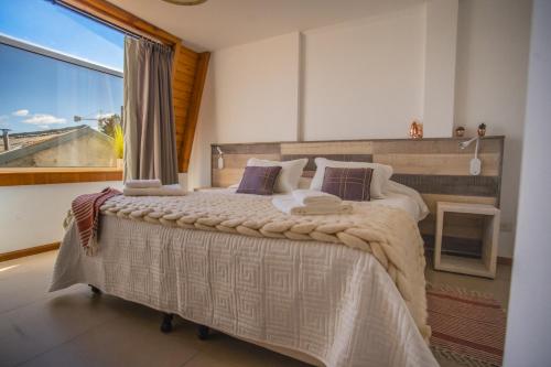 Postel nebo postele na pokoji v ubytování Sweet view del Nahuel