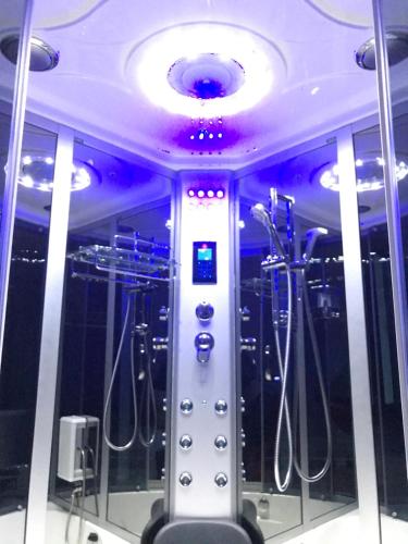 a bathroom with many toothbrushes on a boat at B&B WELLNESS Junior Suite CAREN in Grinzane Cavour