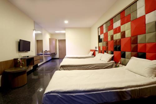 Кровать или кровати в номере Hotel AGC