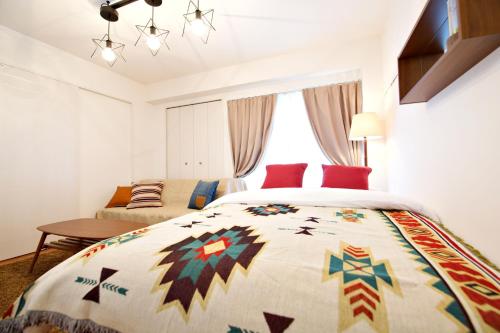 Кровать или кровати в номере Matsufuji 2F