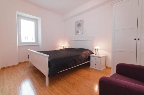 Ένα ή περισσότερα κρεβάτια σε δωμάτιο στο Apartment Tranquillo