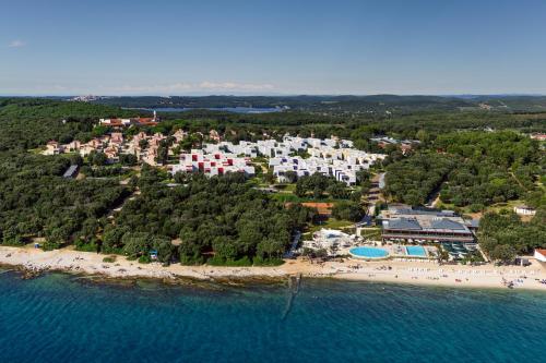 an aerial view of a resort on a beach at Maistra Select Amarin Resort in Rovinj