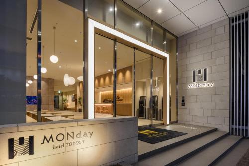 a view of the front of a monday inventory store at hotel MONday Premium TOYOSU in Tokyo