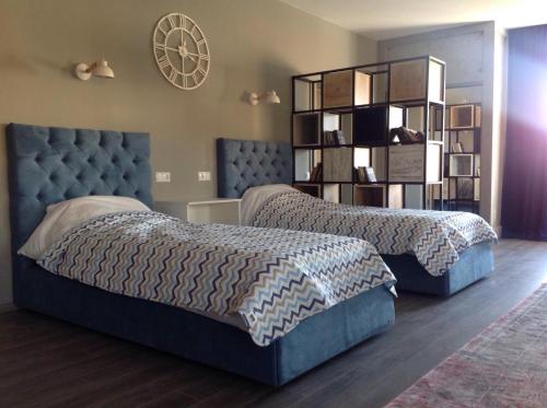 Кровать или кровати в номере Dream Apartament