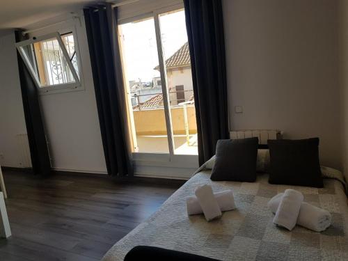Postel nebo postele na pokoji v ubytování Hostal Termes