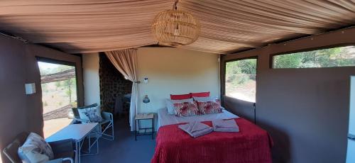 Postel nebo postele na pokoji v ubytování Shamba Yetu Mountain Lodge