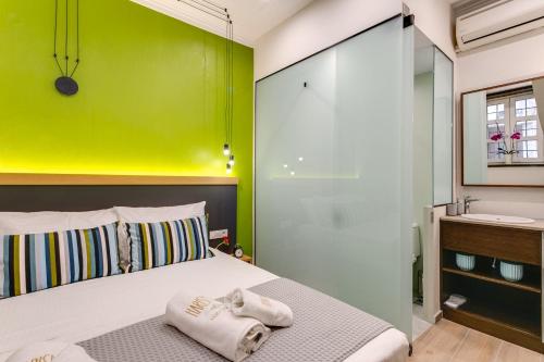 Ένα ή περισσότερα κρεβάτια σε δωμάτιο στο Harismari Cozy Hotel