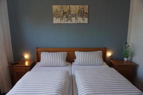 Łóżko lub łóżka w pokoju w obiekcie Ferienwohnung Berta Lüneburg