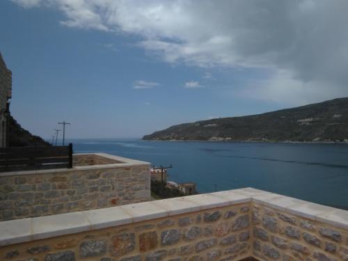 a view of a large body of water at Traditional Apartments Plagiaki in Neon Oitilon