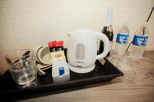 a coffee maker on a tray on a kitchen counter at Soleil B&B Gozo in Għarb