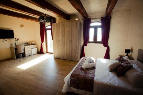 Postel nebo postele na pokoji v ubytování Soleil B&B Gozo