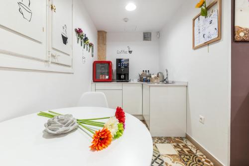 Una cocina o zona de cocina en Hostal 977
