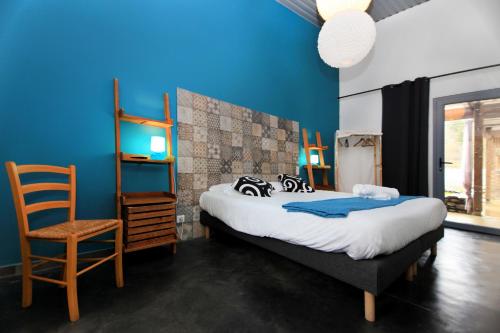 Postel nebo postele na pokoji v ubytování Hôtel Ascosa Aventure
