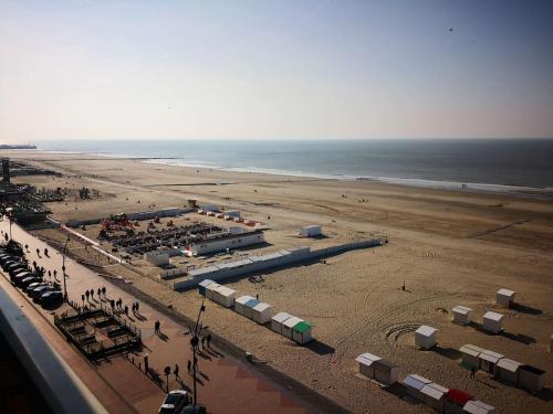 an aerial view of a beach with the ocean at Luxe seaview appartment in Blankenberge